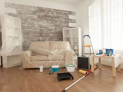 Renovated room with dust and debris before post-construction cleaning
