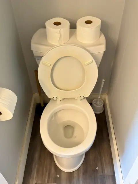 Same toilet stained before the move-out cleaning